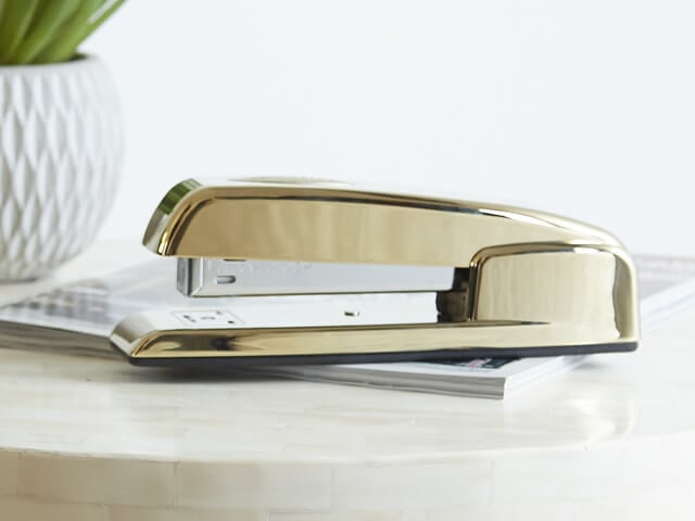 Gold Swingline Stapler on desk